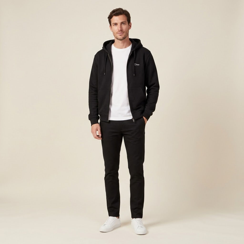 Model wearing a black hooded zip-up jacket