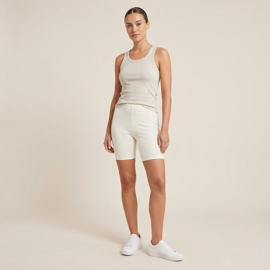 Model wearing ivory biker shorts