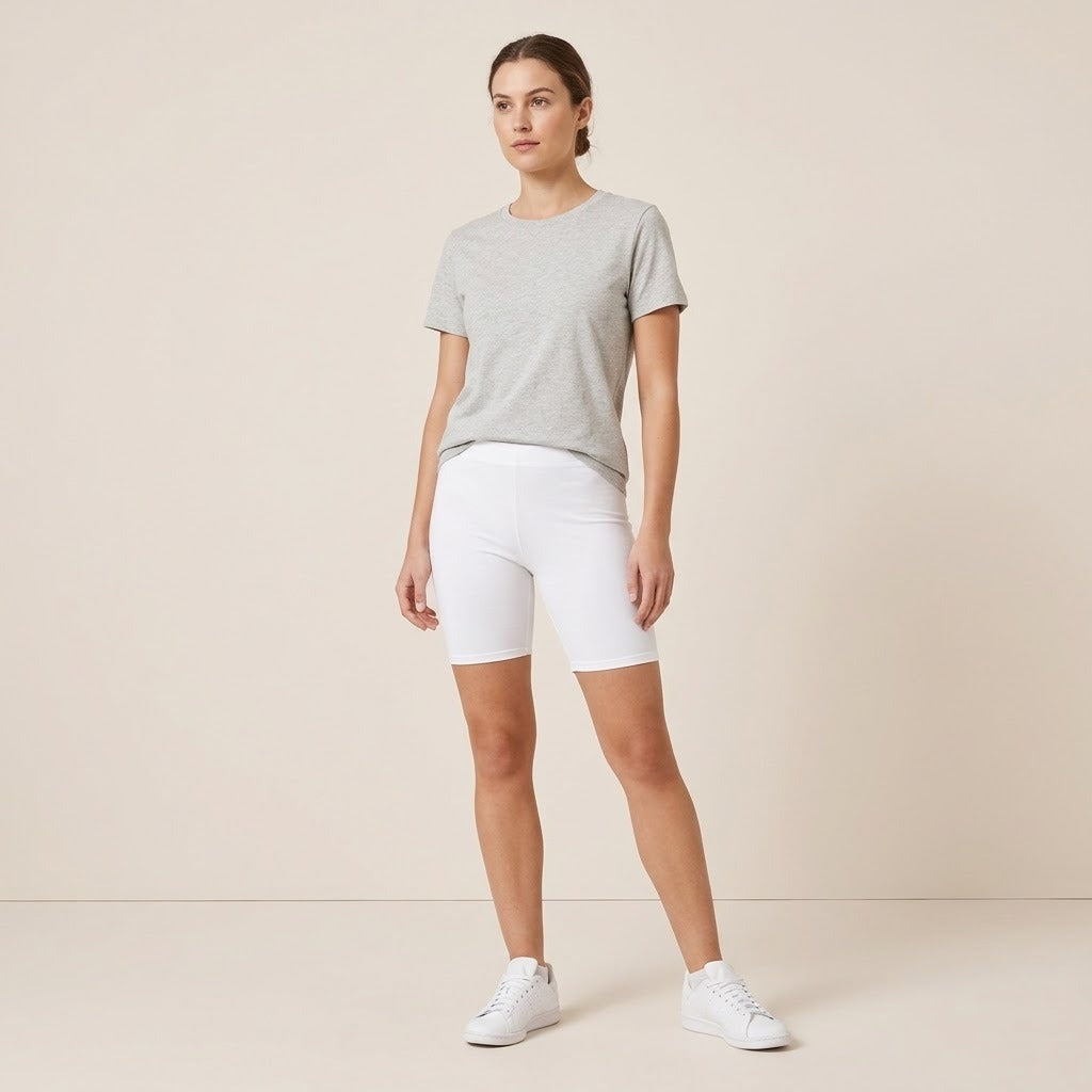 Model wearing white biker shorts